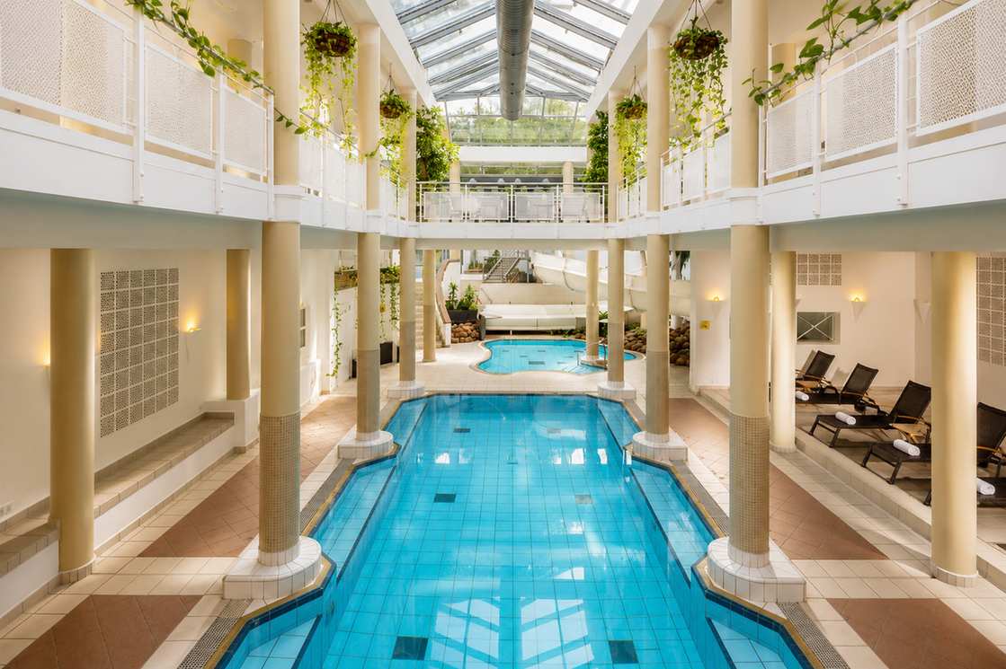 Kaskaden Spa indoor pool beneath a glass roof